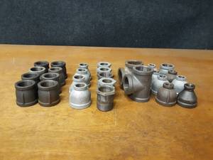 lot 2148 image: Lot of (32) Steel Pipe Fittings - 1-12 Reducers, Tees & Bushings