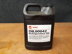 lot 2167 image: NEW 1 Gallon Jug TRANE Refrigerant Oil Part No. OIL00042