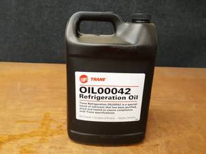 lot 2168 image: NEW 1 Gallon Jug TRANE Refrigerant Oil Part No. OIL00042