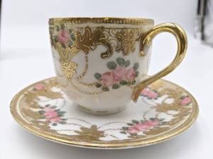 lot 79 image: Vintage Hand Painted Teacup and Saucer