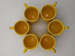 lot 51 image: 6 1930s Yellow Lotus Footed Cup By Metlox