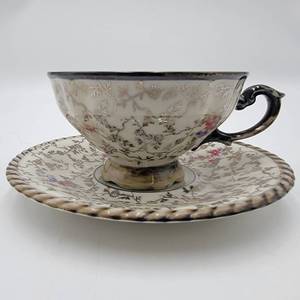 lot 100 image: Very Rare 1940s Vintage RW Rudolf Wachter  Demitasse Cup and Saucer with Silver Overlay- Made in Germany U.S. Zone