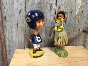 lot 92 image: Vintage Chicago Bears Bobble Head & Aloha Girl Bobble Head