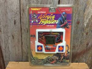 lot 96 image: Vintage Tiger Electronic Ninja Fighter Factory Sealed