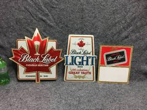 lot 102 image: Vintage Black Label Beer Foil Advertiser Signs