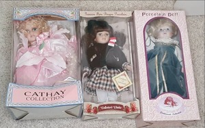 lot 343 image: Lot of 3 porcelain dolls still in o...