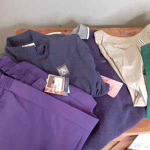 lot 464 image: Large Lot of Womens Golf Attire. Swea...
