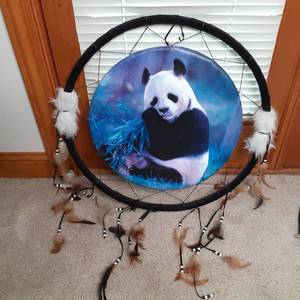 lot 552 image: Dream Catcher with a Panda Bear Cen...
