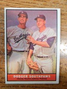 lot 129 image: 1961 Topps #207 Dodger SouthpawsSandy KoufaxJohnny Podres