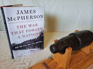 lot 31 image: (1) Civil War Book & Artillery Round