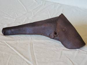 lot 34 image: (1) Civil War Book & Civil War Era Left Sided Revolver Holster for a .36 Caliber Colt Receiver