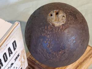lot 56 image: (1) Civil War Book & (1) Large Civil War Cannon Ball
