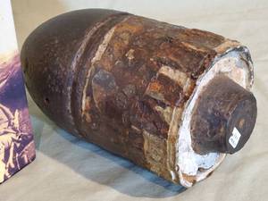 lot 133 image: (1) Civil War Book & (1) Civil War Artillery Projectile 8 Tall