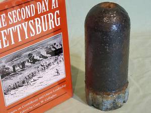 lot 177 image: (1) Civil War Book & (1) Civil War Artillery Round 7 Tall