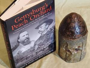 lot 167 image: (1) Civil War Book & (1) Civil War Artillery Round 7 Tall