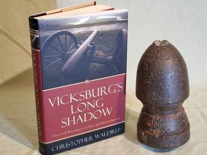 lot 168 image: (1) Civil War Book & (1) Civil War Hotchkiss Artillery Round 7 Tall