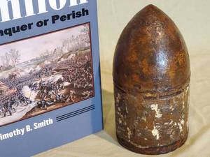 lot 169 image: (1) Civil War Book & (1) Civil War Artillery Round 7 Tall