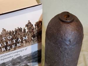 lot 179 image: (1) Civil War Book & (1) Large Civil War Artillery Round 10 Tall