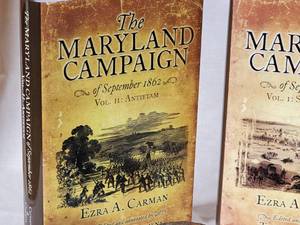 lot 191 image: (3) Vol Civil War Books & (2) Civil War Cannon Balls