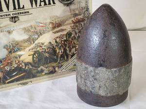 lot 207 image: (1) Civil War Book & (1) Civil War Hotchkiss Artillery Round 7 Tall
