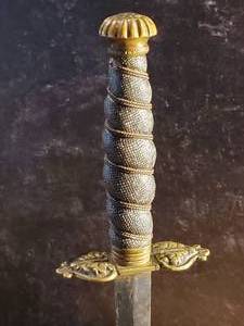 lot 69 image: Awesome Early Brass Sheathed Dirk with 6.5 Double Sided Blade