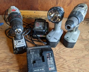 lot 31 image: Porter Cable Flashlight & Drills See photos