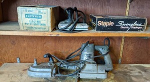 lot 17 image: Power Tools Electric Staplegun, Putty Softener, Band Saw, etc.