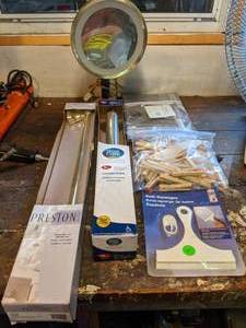 lot 118 image: Lighted Magnifying Mirror, Towel Rack, Squeegee, Clothespins, Grab Bar, Garment Covers
