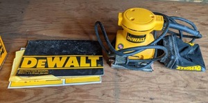 lot 57 image: DeWalt 14 Sheet Heavy Duty Palm Grip Sander with Dust Collection System