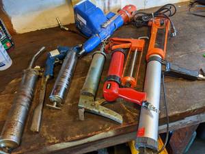 lot 90 image: QuikPoint Mortar Gun with Drill, Caulking Guns, etc.