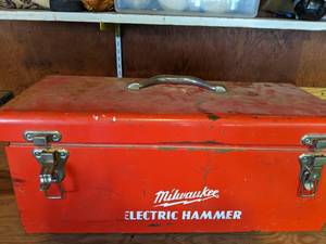 lot 49 image: Milwaukee Electric Hammer and Metal Toolbox