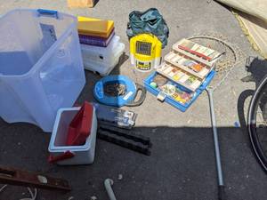 lot 186 image: Bin of Fishing Supplies Net, Tackle Box, Cooler, Minnow Bucket, Rod Holders, Etc.