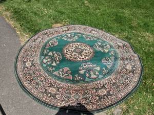 lot 192 image: 76 Round Persian Rug