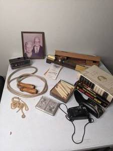 lot 298 image: Fun Vintage Items Inertia Nutcracker, Jump Rope, Film Camera, String of Pearls, etc.