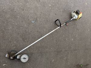 lot 159 image: Gas Powered Echo Weed Wacker  Edger