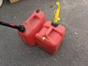 lot 153 image: (2) Plastic Gas Cans Chilton