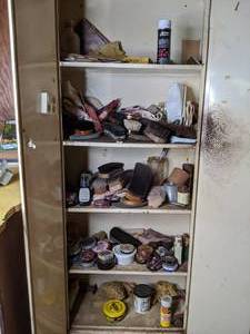 lot 382 image: Metal Cabinet Filled with Shoe Shine Supplies