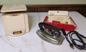 lot 374 image: Vintage Universal Stainless Steel Foldable Steam Iron w Original Case & Universal Vintage Scale