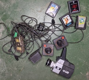 lot 476 image: Vintage Atari Games & Joysticks, & Vintage Super 8 Cam