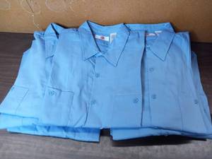 lot 8 image: New In Box 12 Light Blue G&K Wicking Back Long Sleeve Shirts X