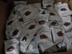 lot 121 image: Box of 100 Bags Dried Cranberries ...