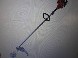 lot 235 image: 2-Cycle 26 CC Straight Shaft Gas Tr...