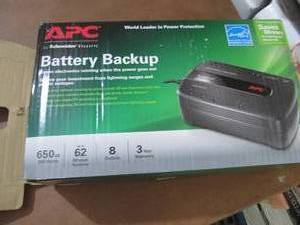 lot 304 image: APC Battery Backup open box...