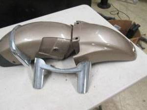 lot 6 image: front fender and chrome piece for a...