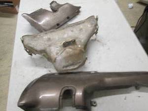 lot 24 image: 3 metal heat shields for a 1988 hon...
