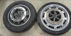 lot 27 image: front and rear rim and tires with a...