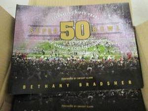 lot 261 image: case of 10 superbowl 50 paper back ...