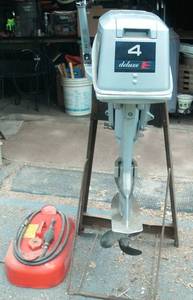 lot 51 image: Evinrude 4hp outboard motor, gas ta...