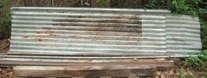 lot 53 image: Corrugated galvanized tin eight 27...