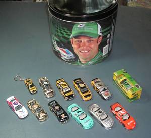 lot 75 image: Cars in tin (12) three Iroc, Mark ...